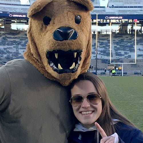 Taylor Machuga with the Penn State Nittany Lion at Beaver Stadium.